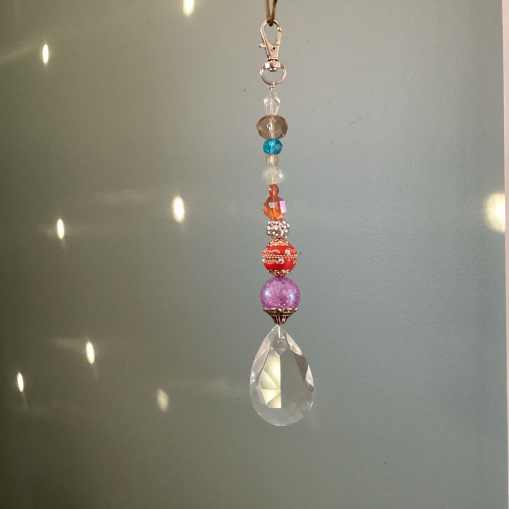 Beaded crystal sun catcher 8 inches long, lobster claw closure prisms galore